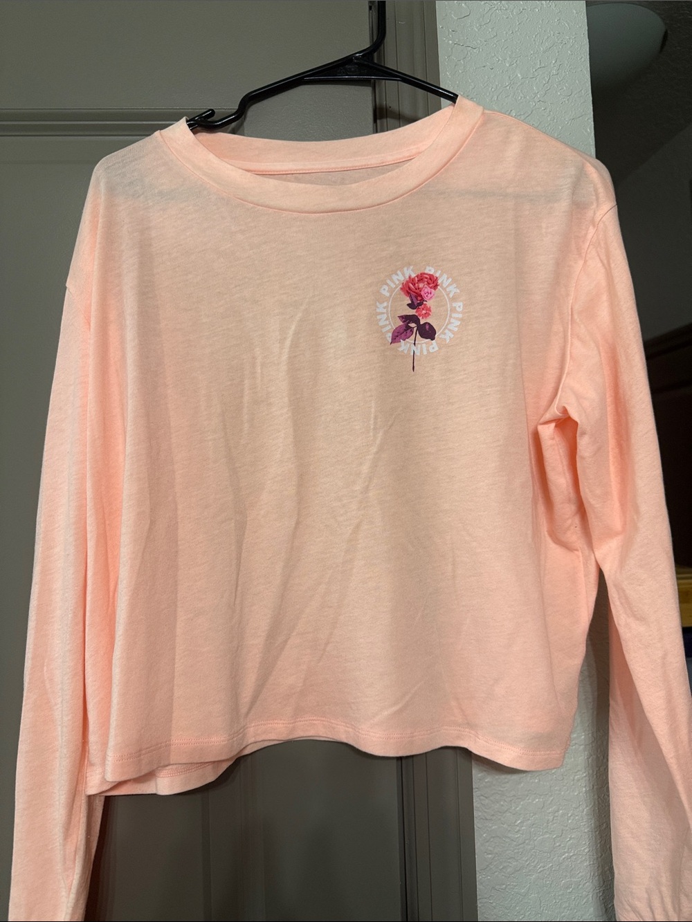 Pink Long-Sleeve Top with Floral Graphic